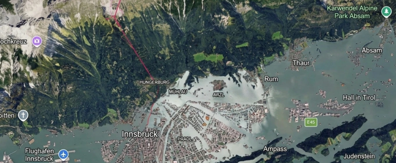 Synthetic test image of Innsbruck showing fictional widespread flooding